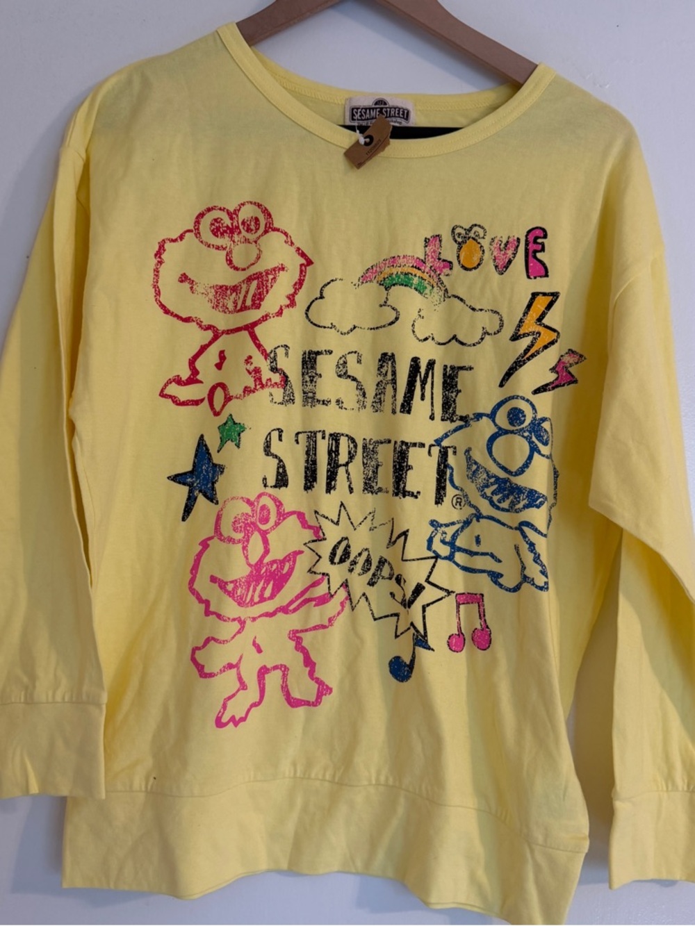 NWT Sesame Street Long Sleeve Shirt Size M Yellow Character